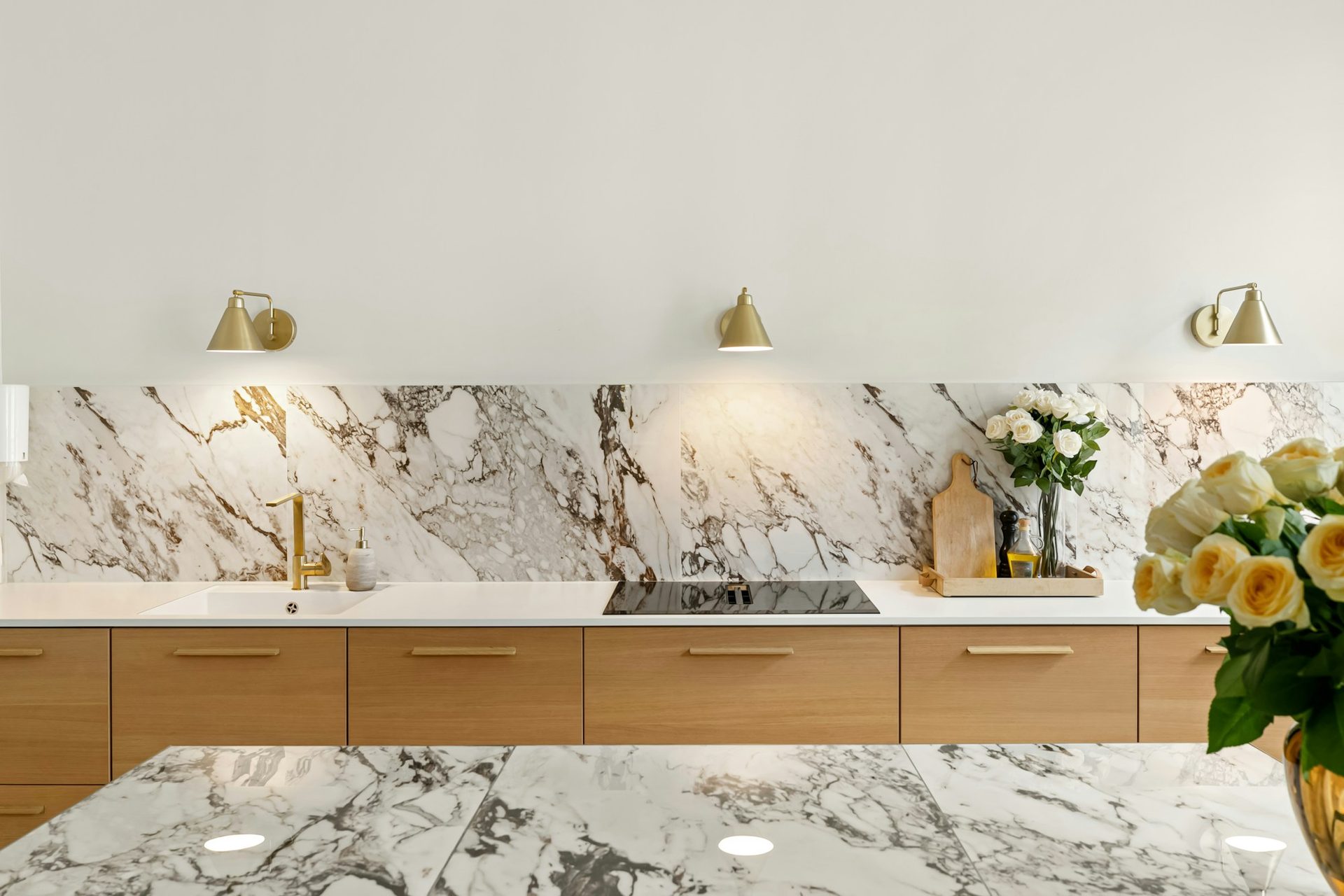Oak kitchen with marble splashback and brass lighting, Rockhampton