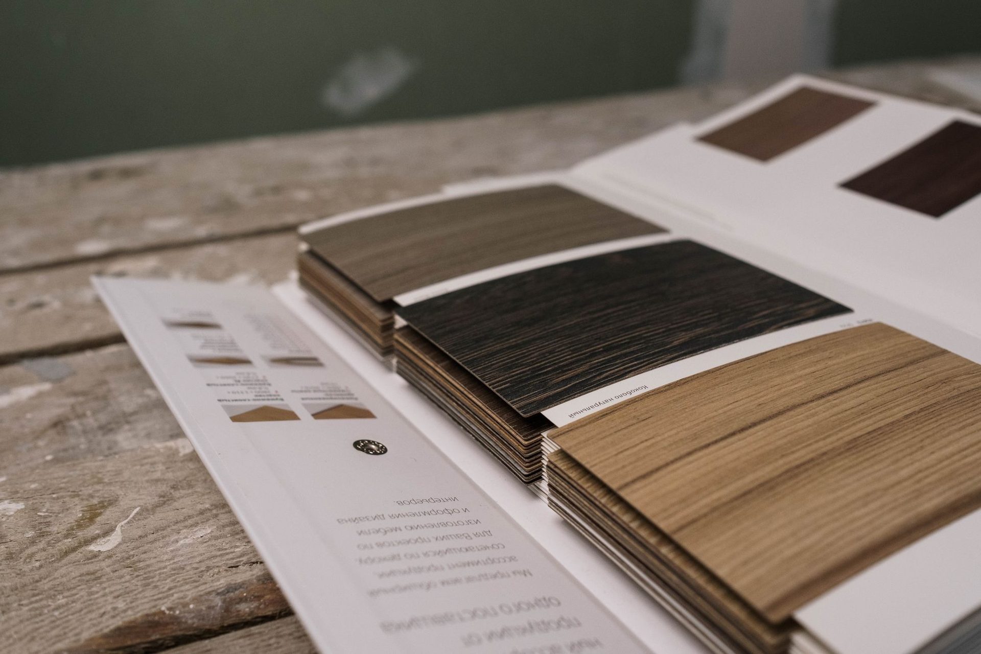 Timber veneer and finish samples on a workbench
